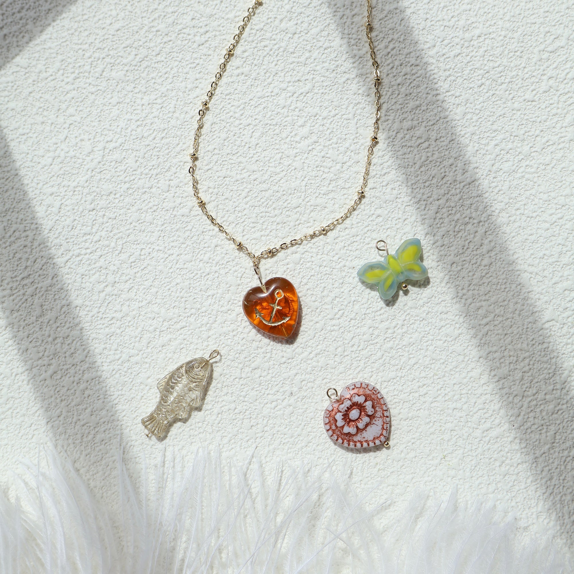 Handmade golden whimsy charm necklace – Jouvi