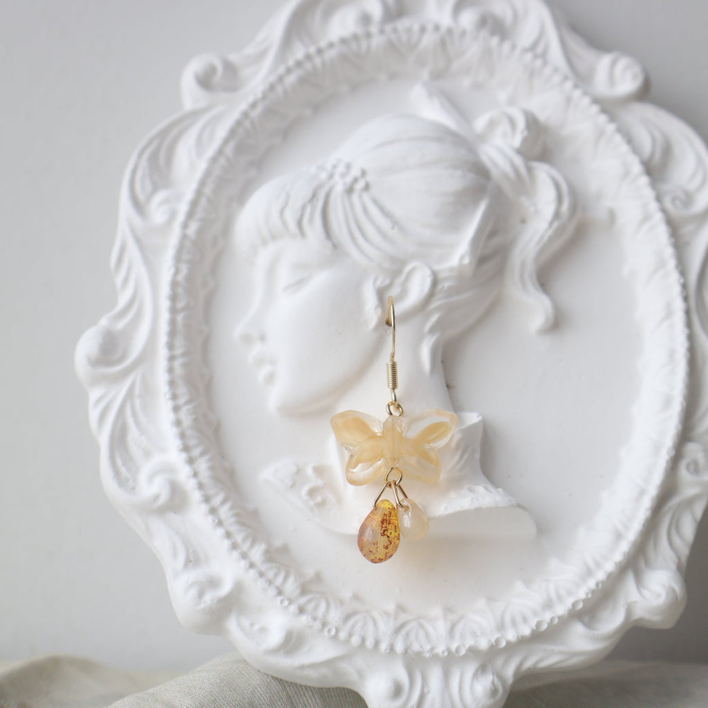 Decorative white plate with a detailed design on a light gray background