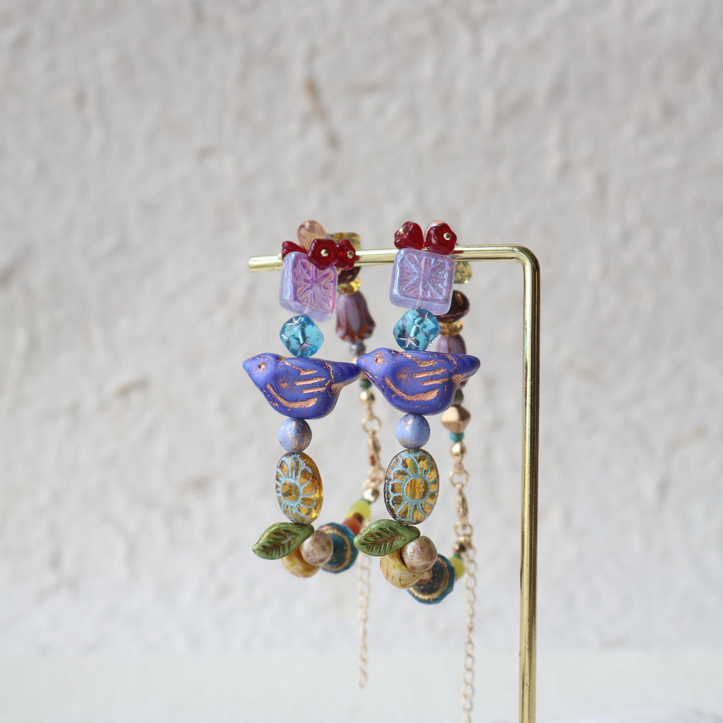 Colorful beaded hair clip on a white background