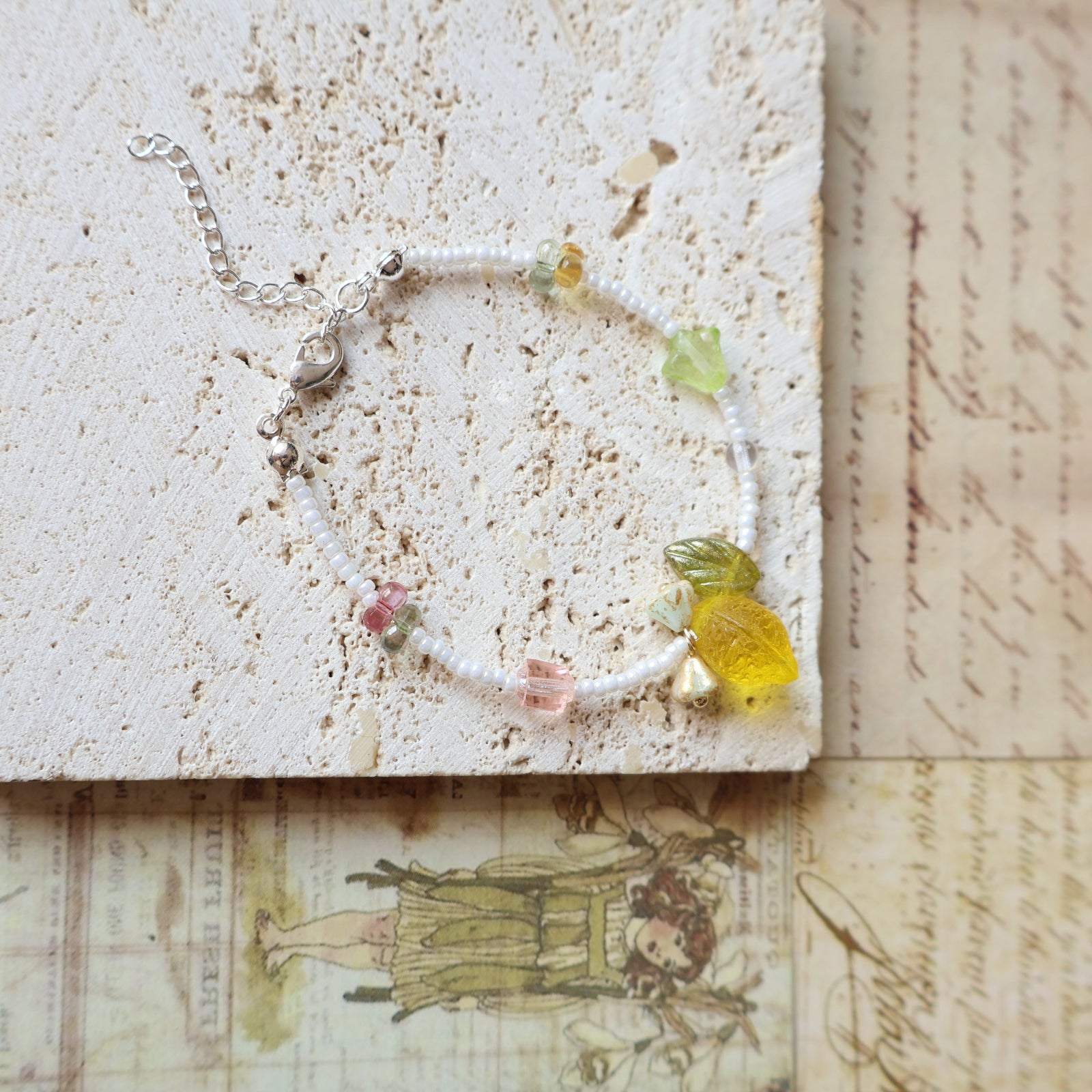 Bracelet with colorful beads on a textured surface