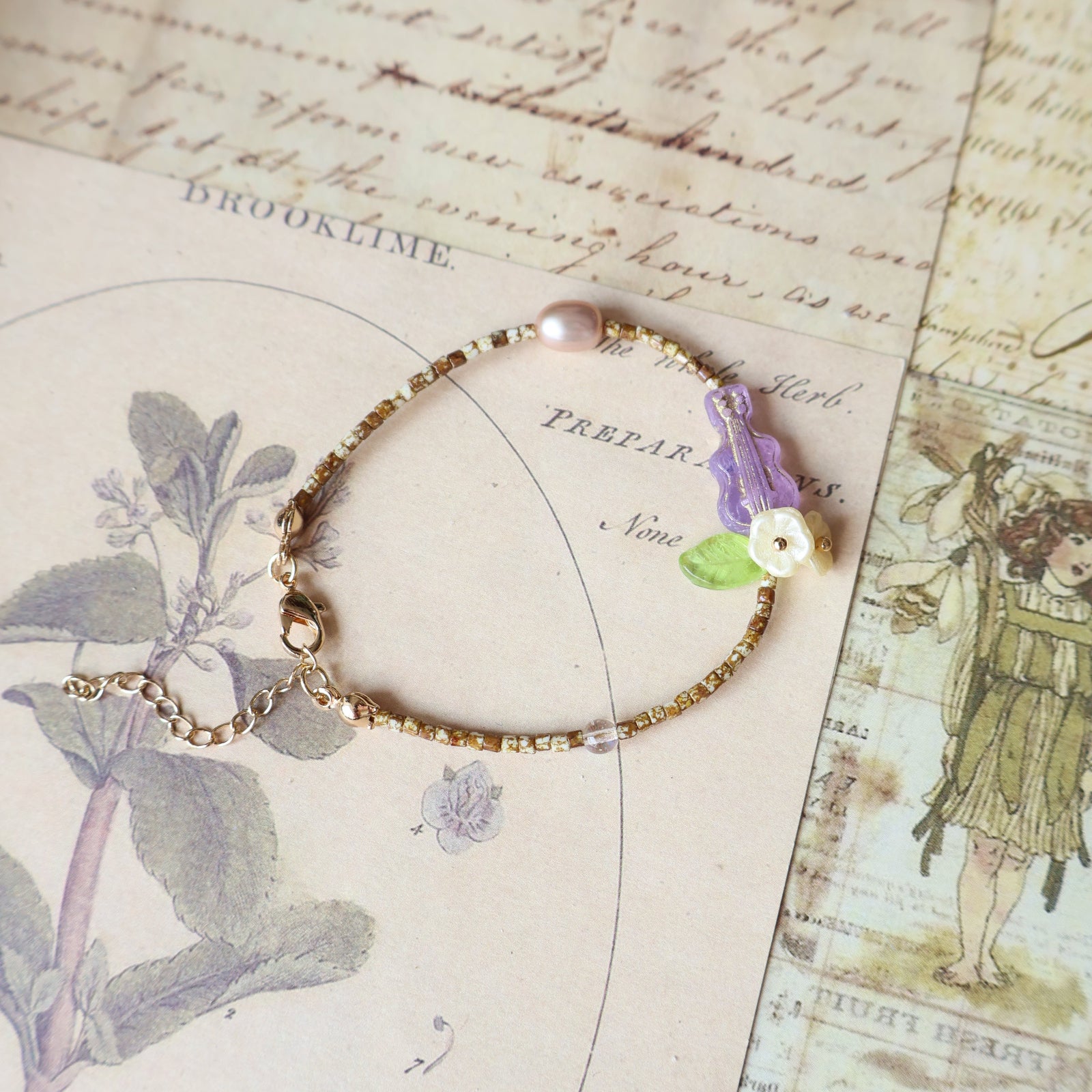 Bracelet with floral charm on a vintage map background